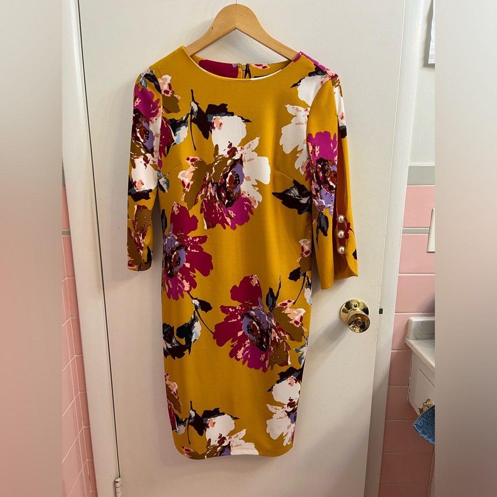 ILE brand dress, yellow floral with pearl sleeve detail, size 6